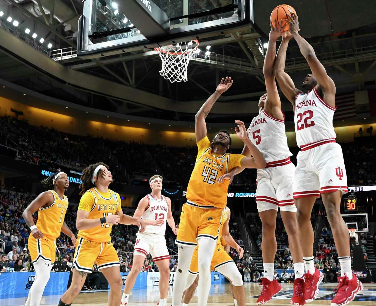 Indiana’s Malik Reneau, Jordan Geronimo, and Kent State’s Cli'Ron Hornbeak reach for the rebound during the first round of the NCAA Men’s Basketball tournament at MVP Arena in Albany, N.Y., on Friday, Mar. 17, 2023. (Jenn March, Special to the Times Union)