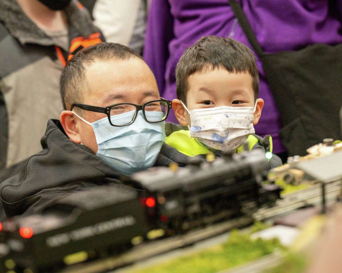 Luke and Jasper Chen check out a model train at the Albany Train Show on Saturday, March 18, 2023, at the Polish Community Center in Albany, NY.