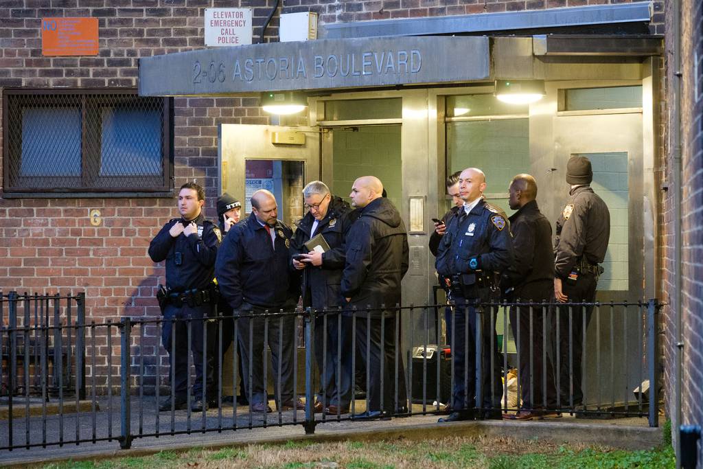 Police investigate a shooting inside 2-06 Astoria Boulevard in the NYCHA Astoria Houses in Queens, New York City on Monday, March 27, 2023.