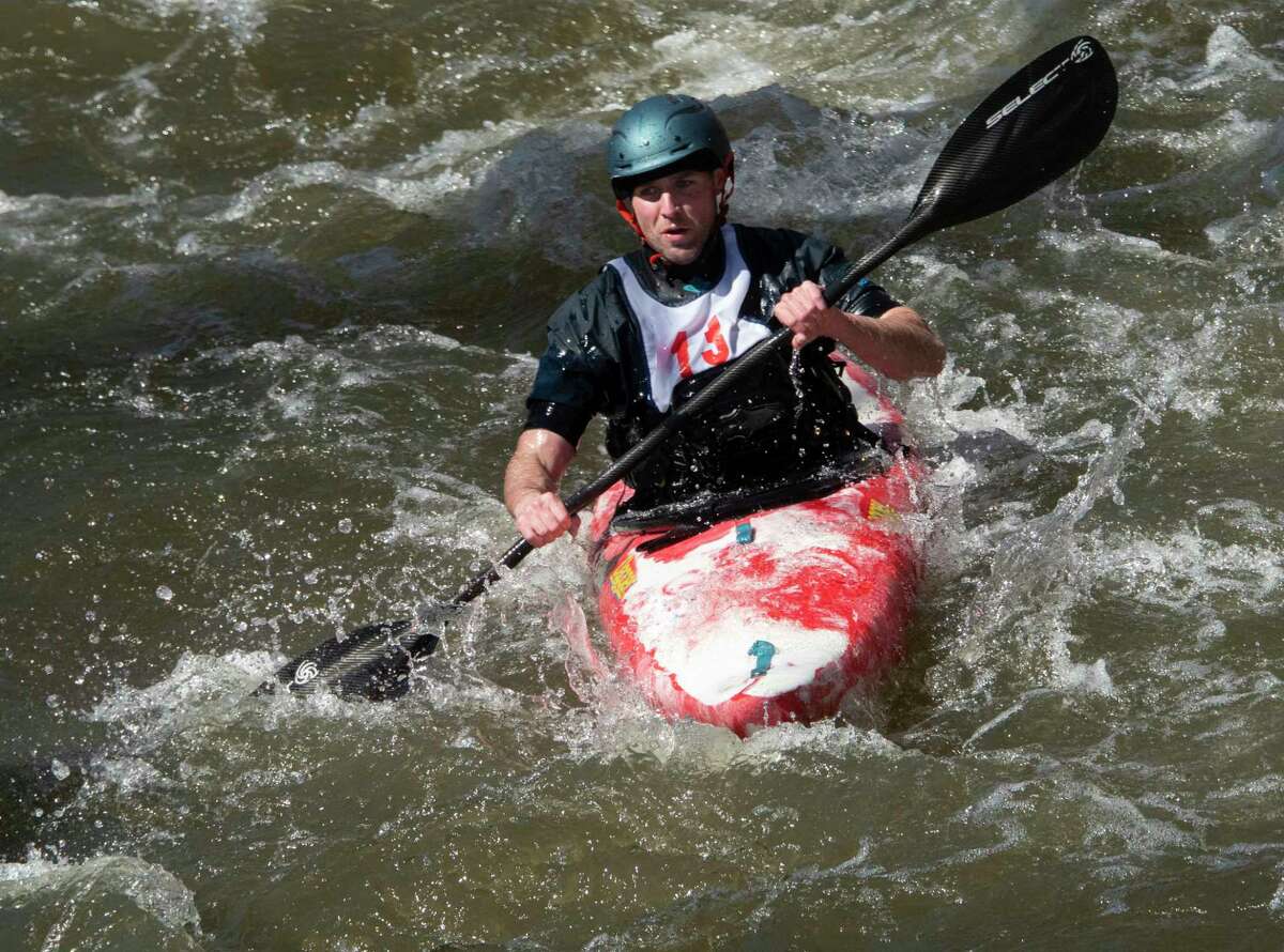 A Kayaker competes in the 48th Annual Tenandeho White-Water Derby on the Anthony Kill on Sunday April 2, 2023 in Mechanicville, N.Y.