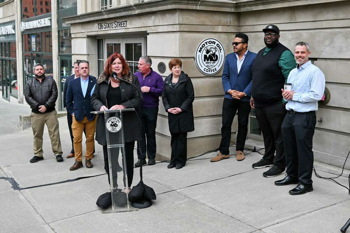 Georgette Steffens, the executive director of the Albany Downtown Improvement District, speaks at the ribbon cutting of Motor Oil Coffee on Wednesday, April 5, 2023, on State Street in Albany, NY.