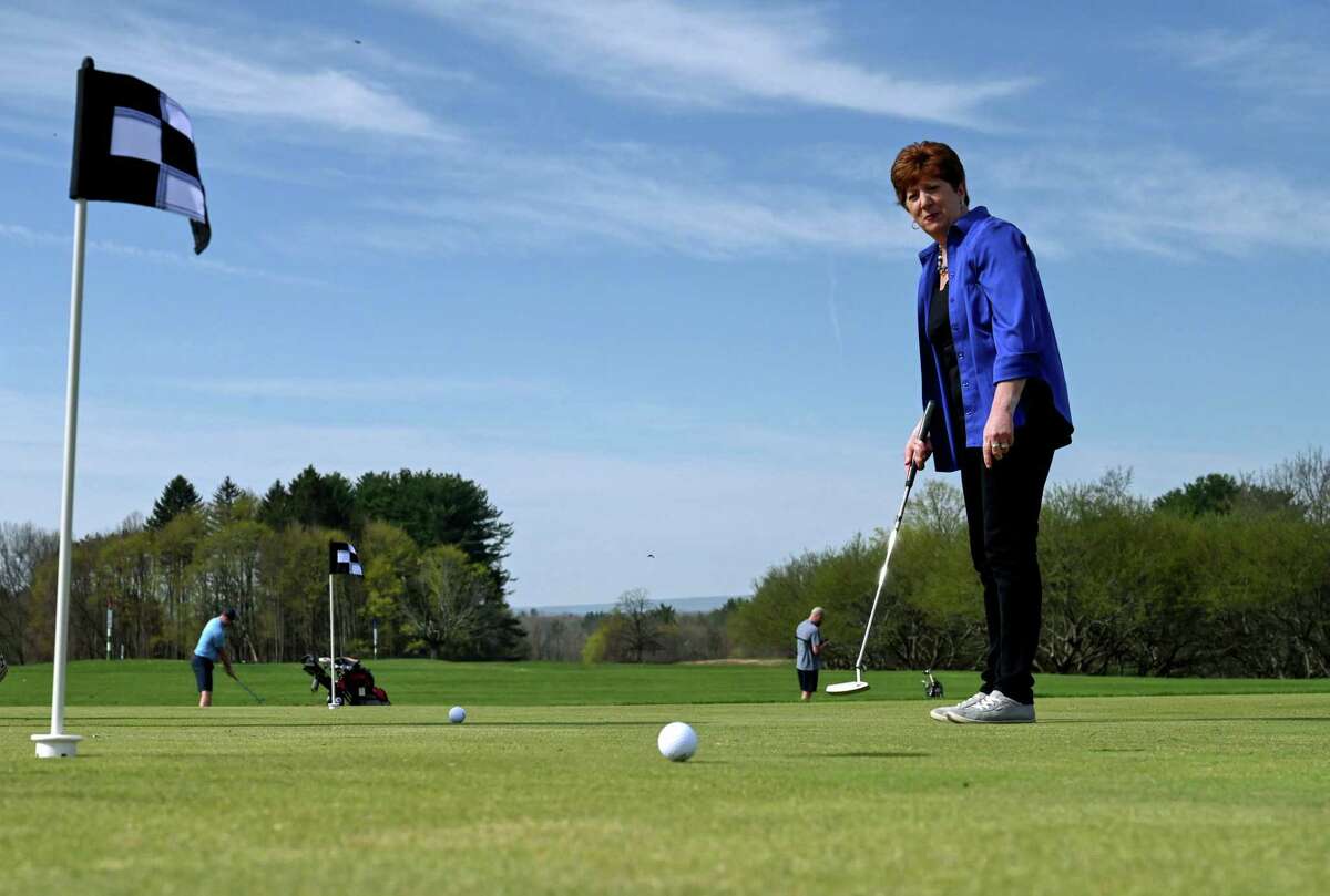 Albany Mayor Kathy Sheehan tests her putting skills on the practice green at Capital Hills Golf Course during an event to mark the start of golfing season at the city course on Friday, April 14, 2023, at Capital Hills Golf Course in Albany, N.Y.