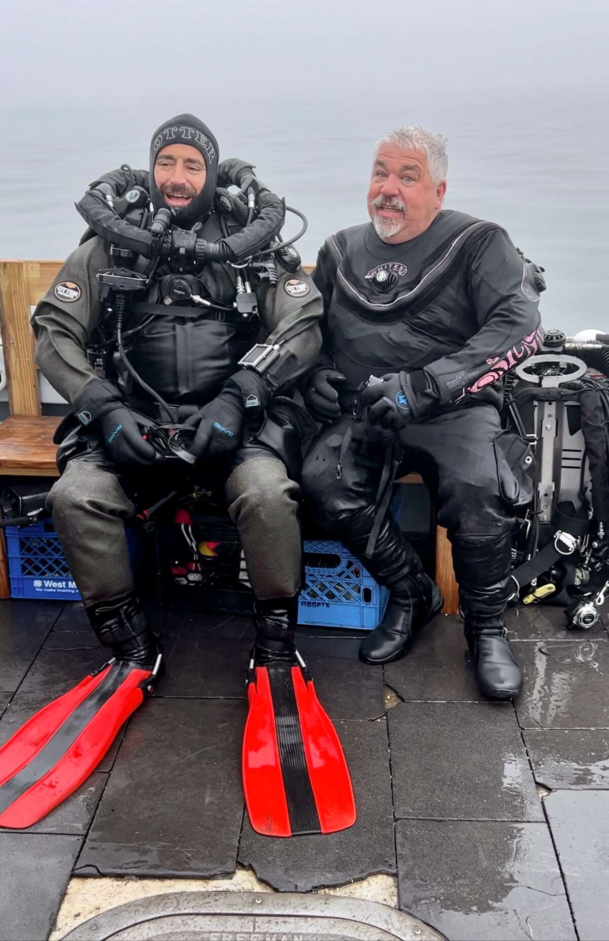 Divers Joe Mazraani, left, and Steven Abbate after their dive to the wreck they believe is the Defender.