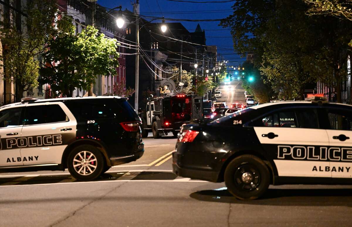 Albany police block off part of Lark Street after they responded to an incident centered around a building in the 100 block of Lark Thursday, April 27, 2023.  