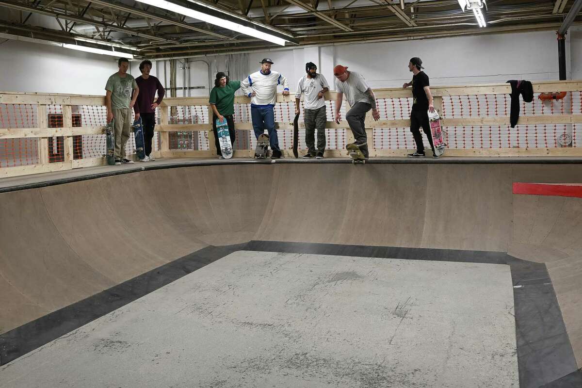 Skateboarders wait their turn during the grand opening of the Noteworthy Community Center’s indoor skate park on Saturday, April 29, 2023, on Broadway in Albany. In addition to the skate area, the center features a platform for live music and art shows, mental health support groups and educational workshops. 