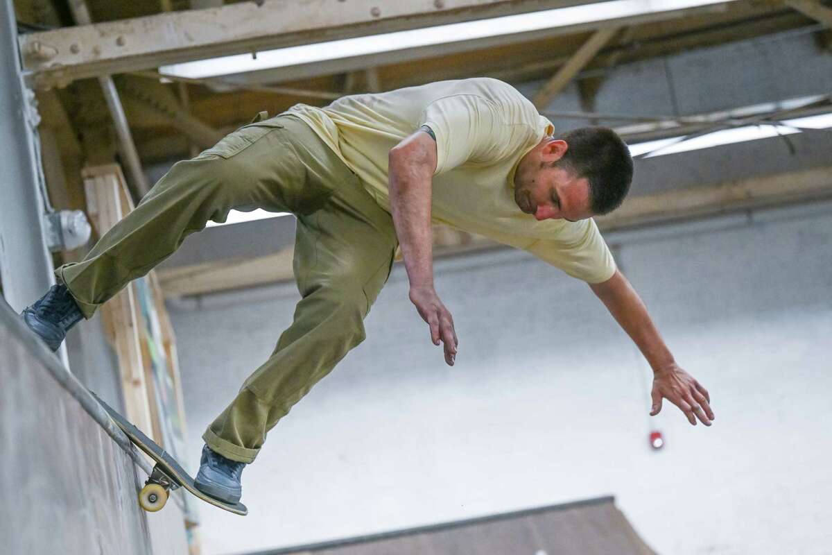 Chevy Rose does a trick during the grand opening of the Noteworthy Community Center’s indoor skate park on Saturday, April 29, 2023, on Broadway in Albany.