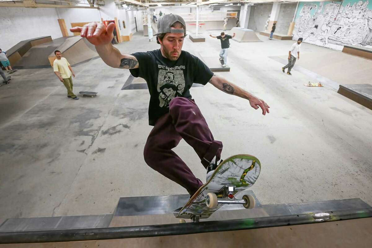 Tracy Madole does tricks during the grand opening of the Noteworthy Community Center’s indoor skate park on Saturday, April 29, 2023, on Broadway in Albany.