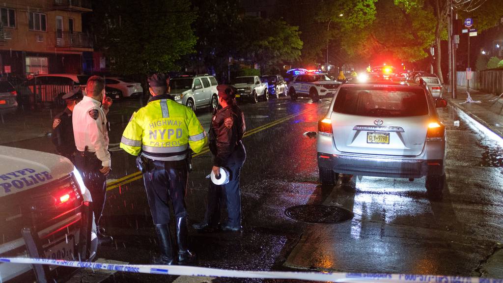 The NYPD Highway Patrol investigates after a pedestrian was fatally struck by a car at 147th St. and 41st Ave. in Queens Friday.