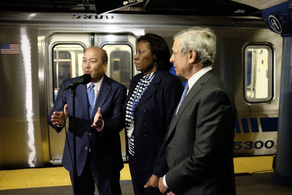 Port Authority chairman Kevin O'Toole joins PATH director Clarelle DeGraff and Executive Director Rick Cotton in christening the new rolling stock.