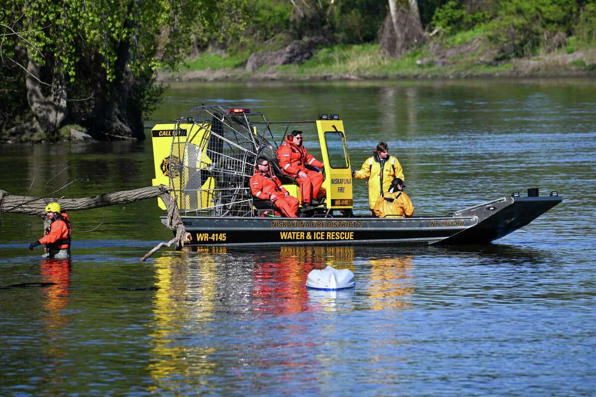 Members of the Niskayuna District 2 Fire Department rescue a would-be capsized kayaker during a multi-agency water rescue training exercise on Saturday, May 6, 2023, along the Mohawk River in Schenectady, NY.