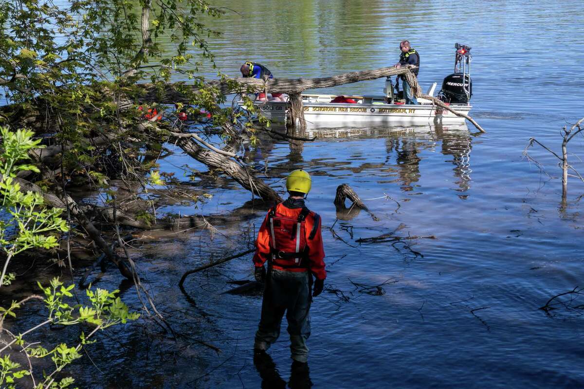 Members of the Schonowe Fire Department rescue a would-be capsized kayaker during a multi-agency water rescue training exercise on Saturday, May 6, 2023, along the Mohawk River in Schenectady, NY.