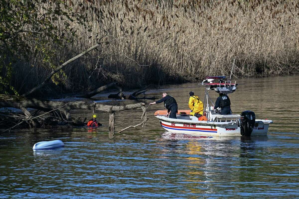 Members of the Scotia Fire Department rescue a would-be capsized kayaker during a multi-agency water rescue training exercise on Saturday, May 6, 2023, along the Mohawk River in Schenectady, NY.