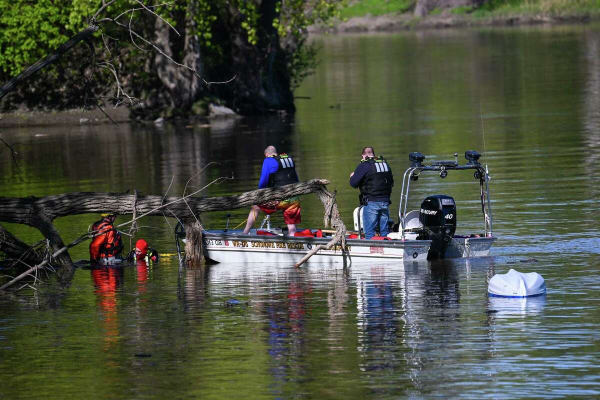 Members of the Schonowe Fire Department rescue a would-be capsized kayaker during a multi-agency water rescue training exercise on Saturday, May 6, 2023, along the Mohawk River in Schenectady, NY.