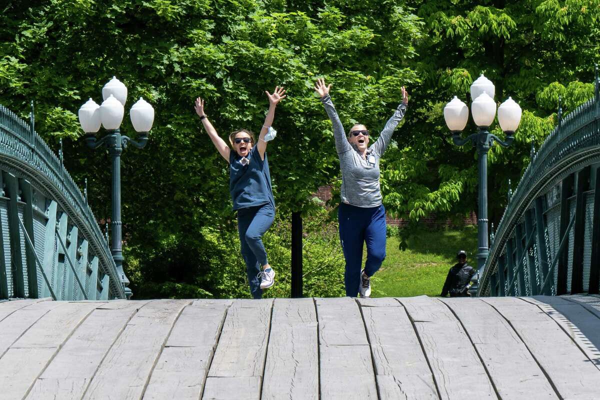 Nicola Platzer, left, and Allison Poetzsch cross the bridge in Washington Park during the 13th annual VA2K Walk and Roll fundraiser held to support the Homeless Veterans Program at the Samuel S. Stratton Department of Veterans Affairs Medical Center on Wednesday, May 17, 2023, in Albany, NY.