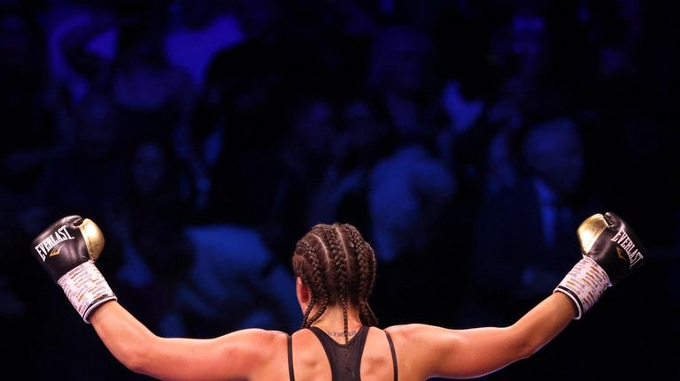 Britain's Chantelle Cameron celebrates after her win over Ireland's Katie...