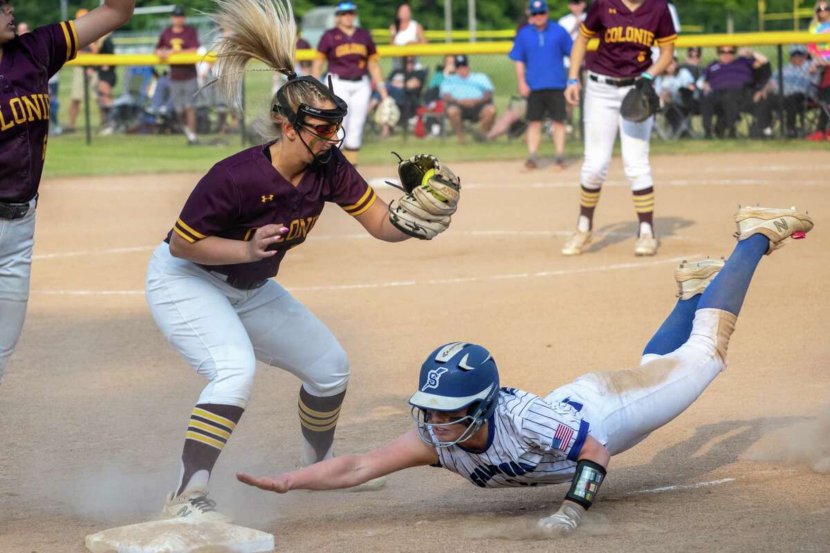 Saratoga baserunner Olivia Tetreault slides into third under a tag by Colonie third baseman Gianna Degonza during a Class AA semifinal on Tuesday, May 23, 2023, at Schalmont High School in Rotterdam, NY.