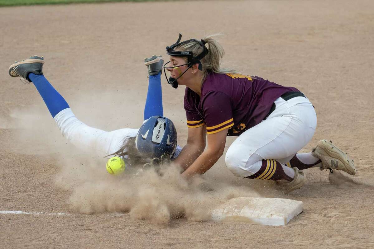 Saratoga baserunner Nia Law slides into third in front of a tag by Colonie third baseman Gianna Degonza during a Class AA semifinal on Tuesday, May 23, 2023, at Schalmont High School in Rotterdam, NY.