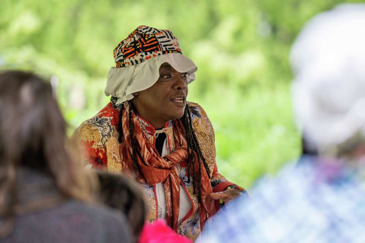 Pinkster Player Marcha Tracey tells a story during Pinkster — which began as a Dutch holiday but became an African celebration of family, hope and cultural identity — on Saturday, June 3, 2023, at Schuyler Mansion in Albany, NY.