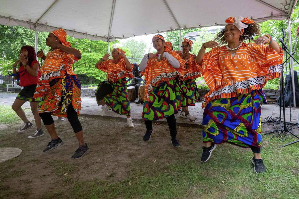 Operation Unite NY dances to music by Zorkie Nelson during Pinkster — which began as a Dutch holiday but became an African celebration of family, hope and cultural identity — on Saturday, June 3, 2023, at Schuyler Mansion in Albany, NY.