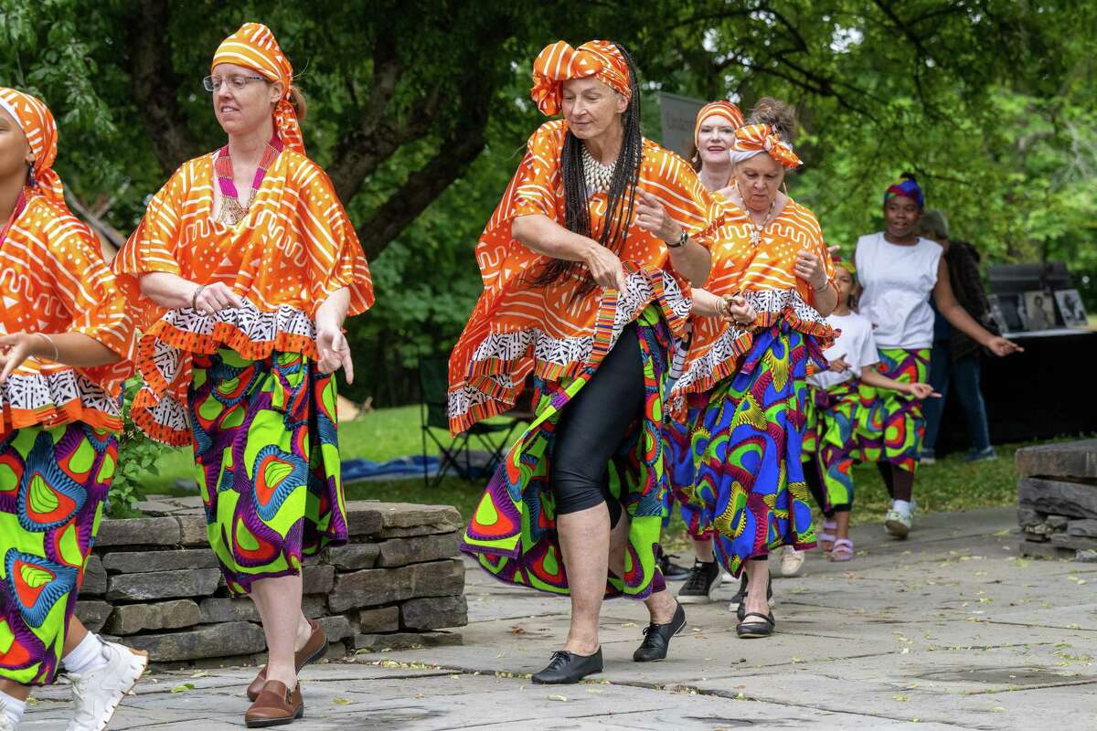 Operation Unite NY dances to music by Zorkie Nelson during Pinkster — which began as a Dutch holiday but became an African celebration of family, hope and cultural identity — on Saturday, June 3, 2023, at Schuyler Mansion in Albany, NY.