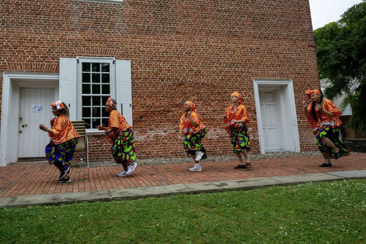 Operation Unite NY dances to music by Zorkie Nelson during Pinkster — which began as a Dutch holiday but became an African celebration of family, hope and cultural identity — on Saturday, June 3, 2023, at Schuyler Mansion in Albany, NY.