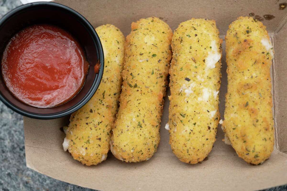 An order of vegan mozzarella sticks are seen as the Capital Region Vegan Network holds their annual Veg Out event featuring vegan food from area restaurants on Sunday, June 4, 2023 in Troy, N.Y.