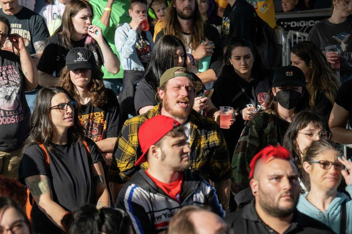 Music fans listen to Bad Luck during the kickoff of the 2023 Alive at Five concert series featuring Hawthorne Heights in the rain location under the Route 787 bridge on Thursday, June 8, 2023, in Albany, NY.