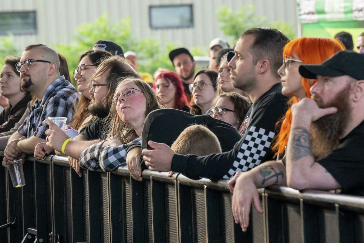 Music fans listen to Bad Luck during the kickoff of the 2023 Alive at Five concert series featuring Hawthorne Heights in the rain location under the Route 787 bridge on Thursday, June 8, 2023, in Albany, NY.