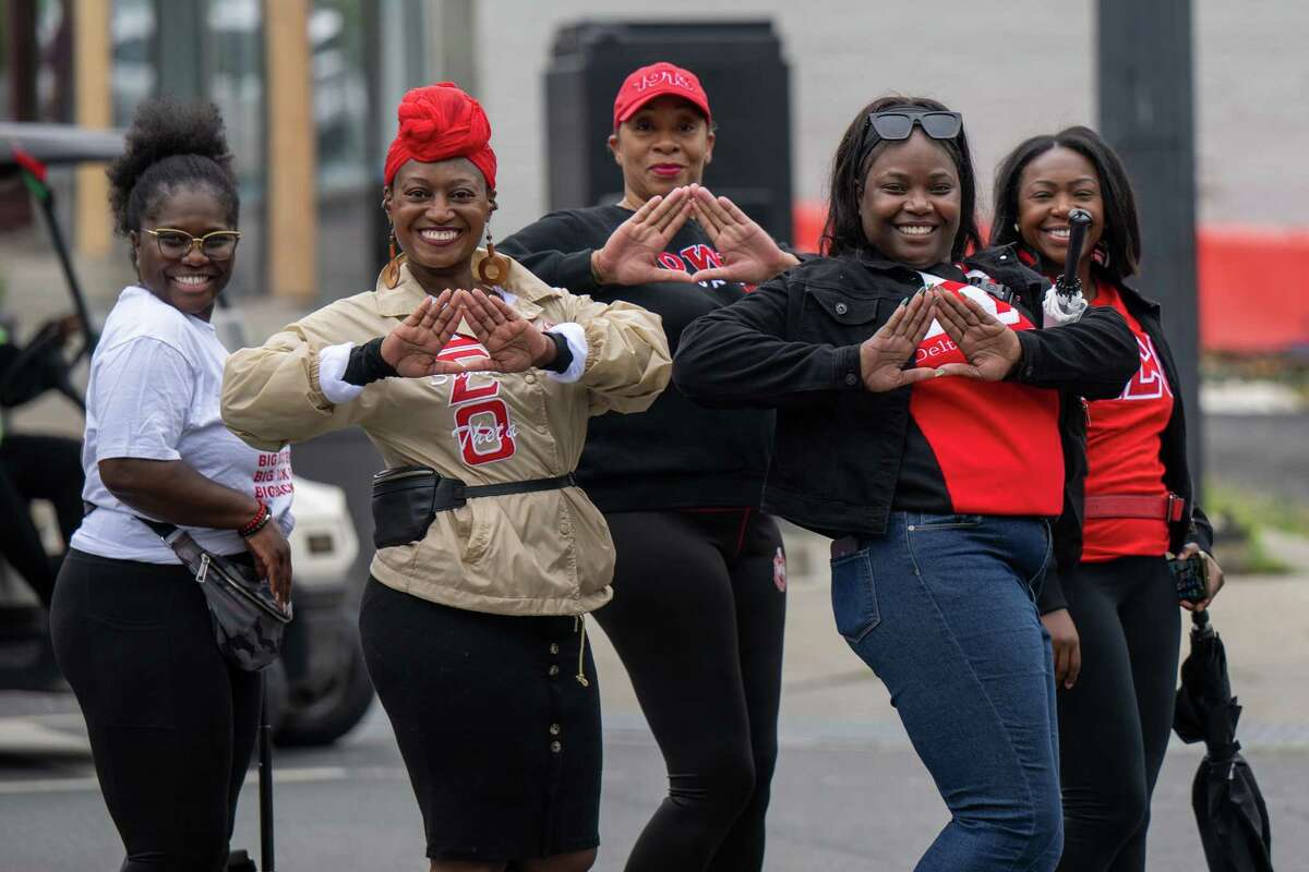 Delta Sigma Theta sorority sisters strike a pose during the Juneteenth parade that began in Washington Park ended at the South End Grocery store on Pearl Street on Saturday, June 17, 2023, in Albany, NY.