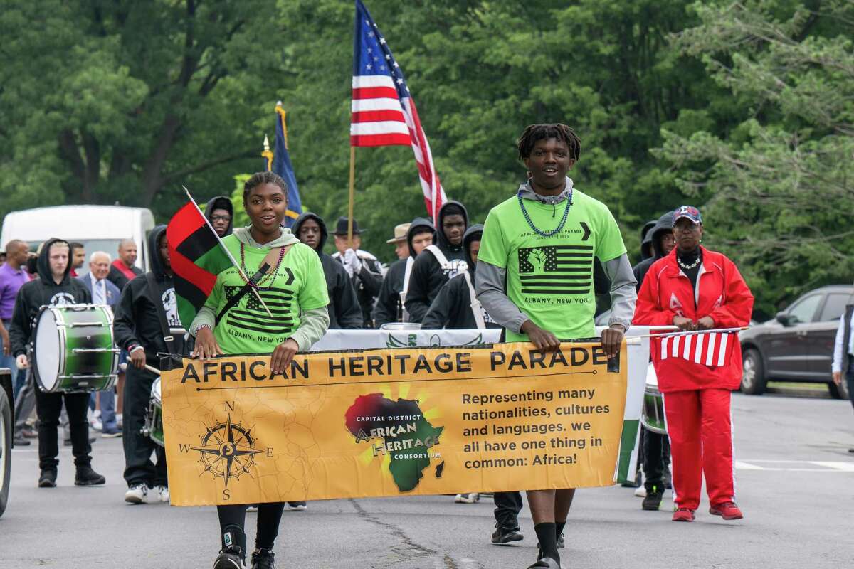 Amelia and DJ Graham lead the Juneteenth parade from Washington Park to the South End Grocery store on Pearl Street on Saturday, June 17, 2023, in Albany, NY.