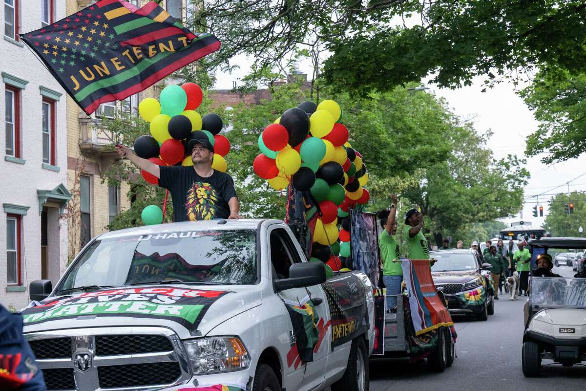 The Albany Community Police Review Board float heads down Madison Avenue during the Juneteenth parade that marched from Washington Park to the South End Grocery store on Pearl Street on Saturday, June 17, 2023, in Albany, NY.