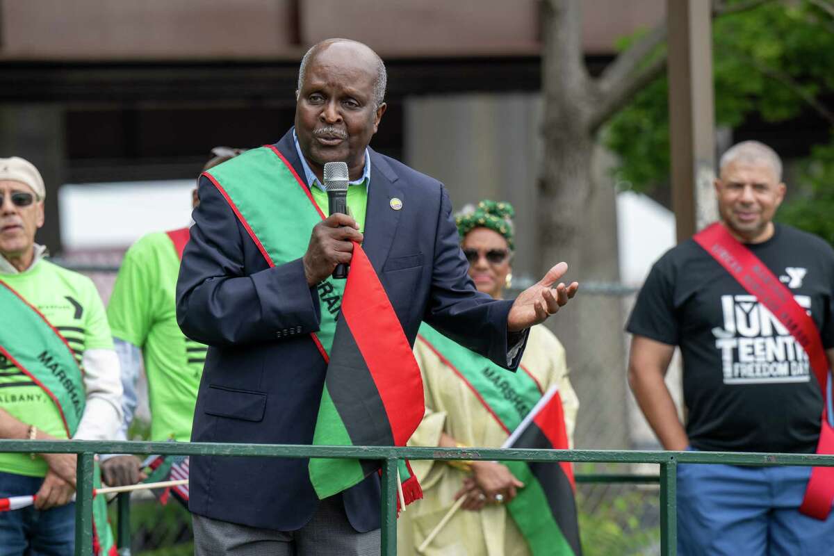 Juneteenth parade Grand Marshall Leroy Twiggs speaks following the parade that began in Washington Park ended at the South End Grocery store on Pearl Street on Saturday, June 17, 2023, in Albany, NY.