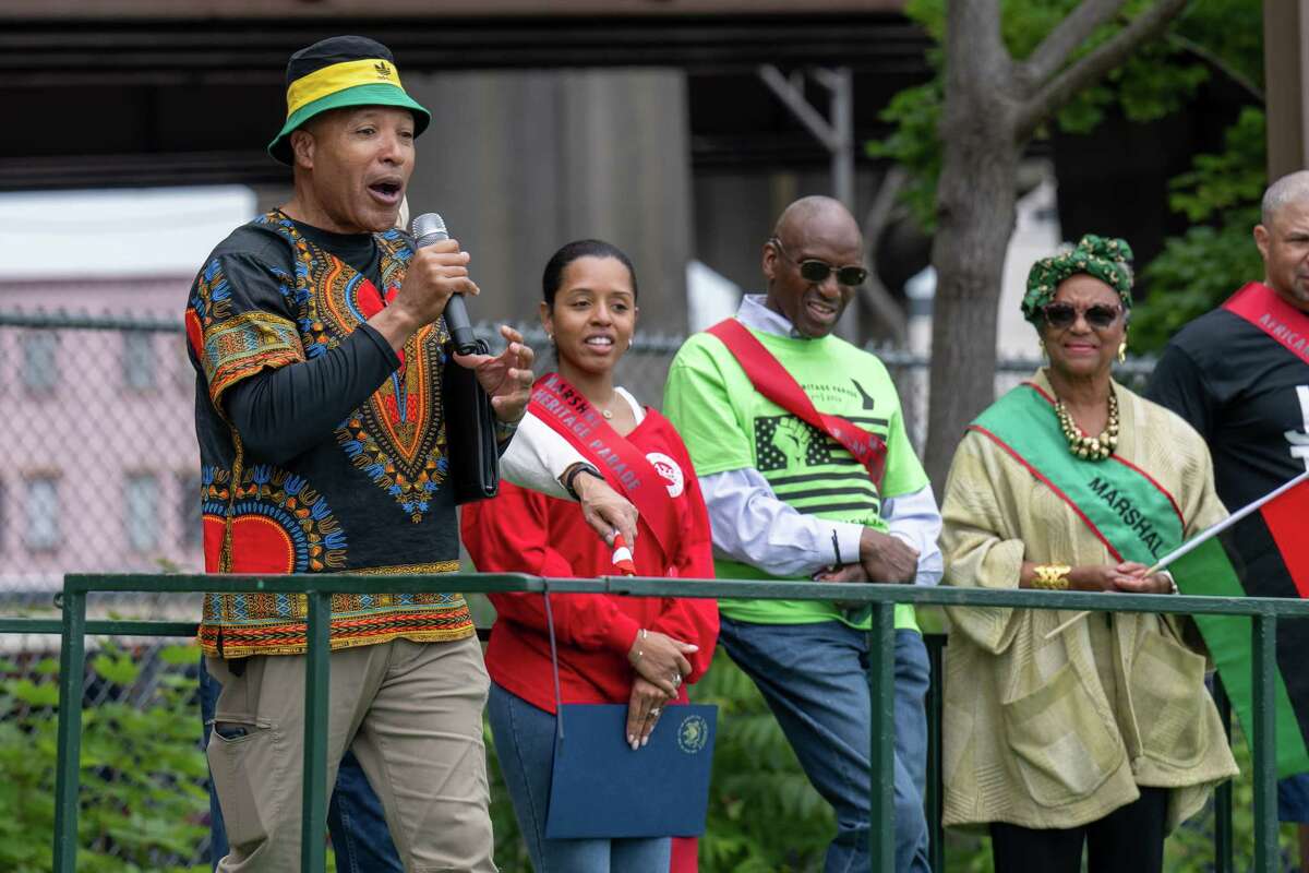 Juneteenth parade organizer Orville Abrahams speaks following the parade that began in Washington Park ended at the South End Grocery store on Pearl Street on Saturday, June 17, 2023, in Albany, NY.