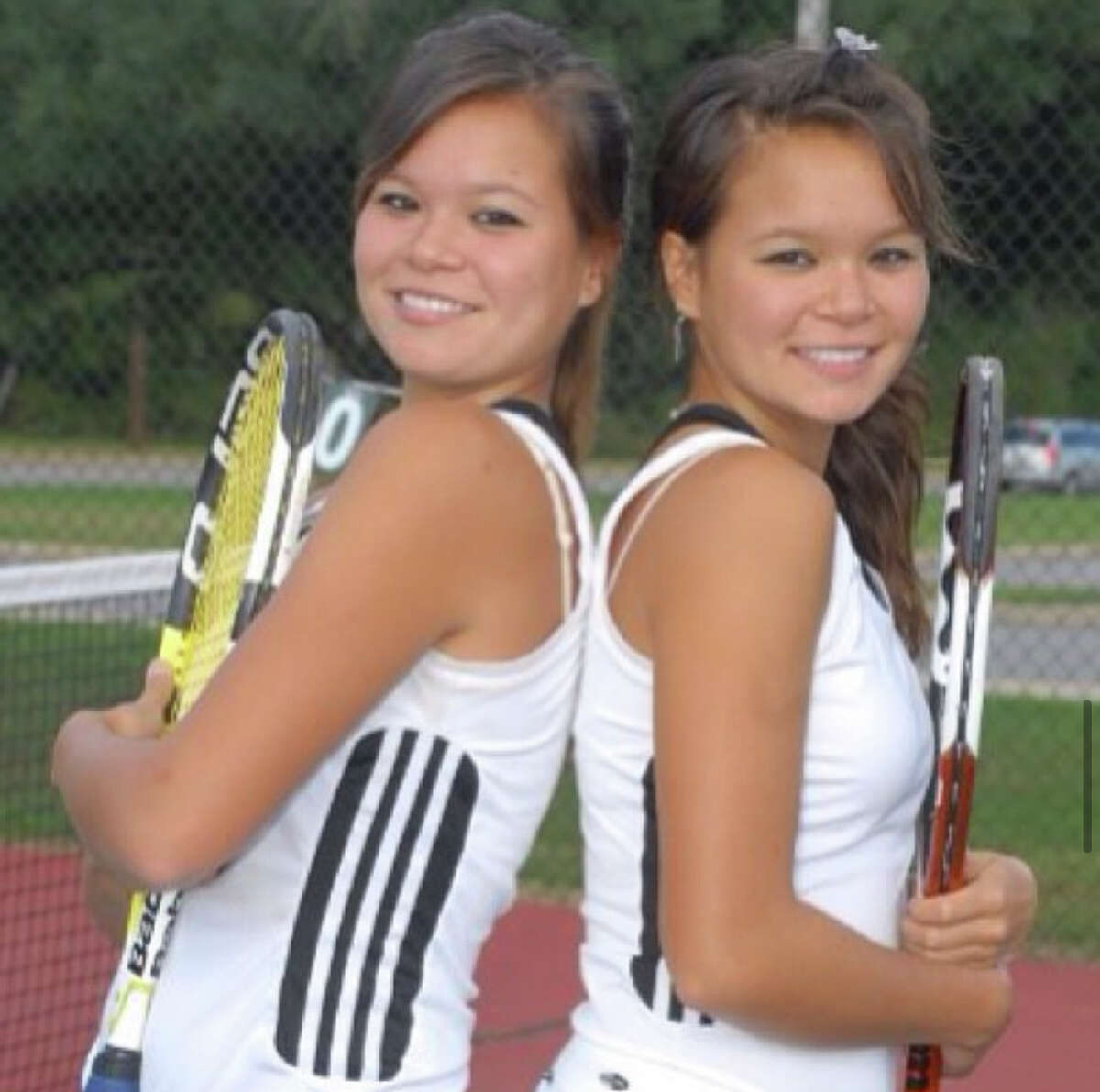 4. My twin and I were regional tennis champs for doubles. We were dubbed "Double Trouble." I also taught private tennis lessons.