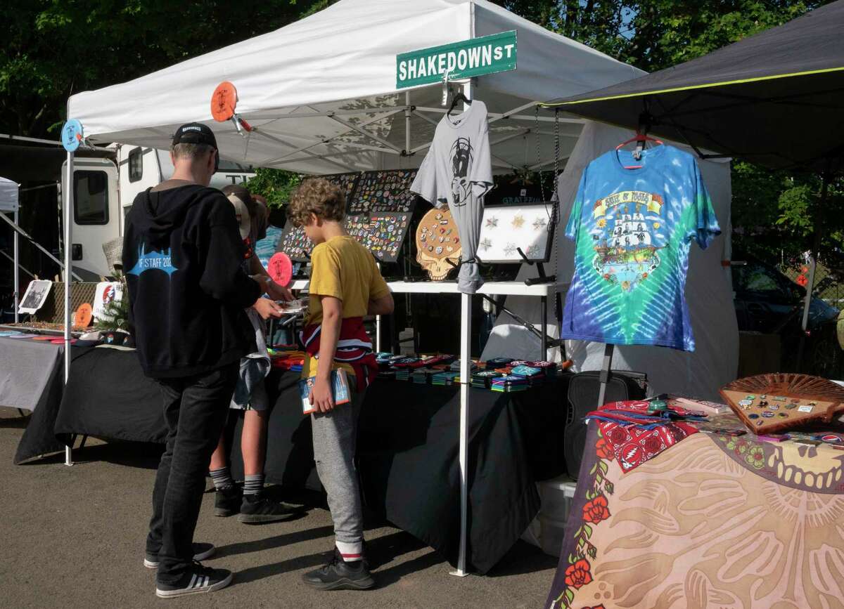 Dead and Company fans shop at the vendors in the Shakedown Street parking lot before the last Dead and Company show at Saratoga Performing Arts Center on Sunday, June 18, 2023, in Saratoga Springs, N.Y. (Lori Van Buren/Times Union)