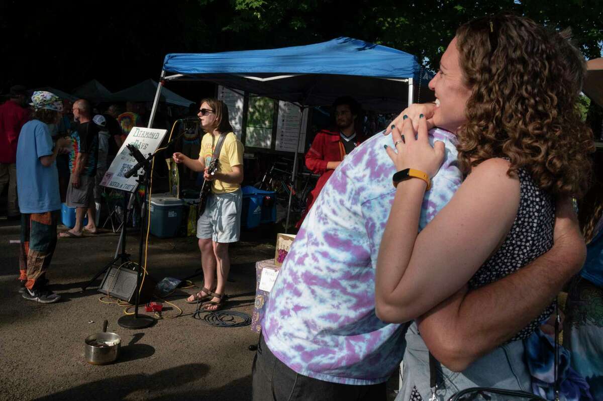 People are seen in the Shakedown Street parking lot before the last Dead and Company show at Saratoga Performing Arts Center on Sunday, June 18, 2023, in Saratoga Springs, N.Y. (Lori Van Buren/Times Union)