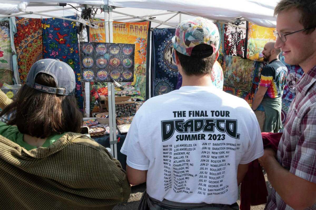 Dead and Company fans shop at vendors in the Shakedown Street parking lot before the last show at Saratoga Performing Arts Center on Sunday, June 18, 2023, in Saratoga Springs, N.Y. (Lori Van Buren/Times Union)