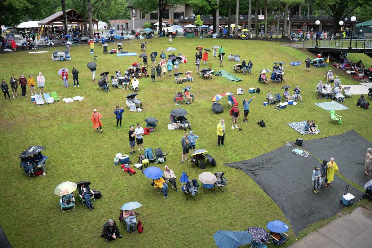 Fans brave the rain while listening to Tower of Power during the Freihofer’s Jazz Fest on Saturday, June 24, 2023, at the Saratoga Performing Arts Center in Saratoga, NY.