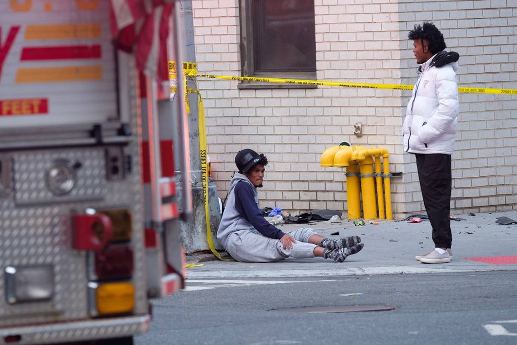 A pedestrian awaits medical treatment after being struck by a car on 3rd Avenue and East 21st Street in Manhattan, New York City on Sunday, June 4, 2023.