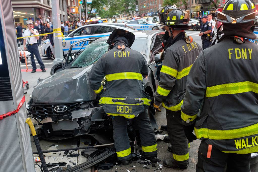 Firefighters respond after a bicyclist and multiple pedestrians were struck by a car on 3rd Avenue and East 21st Street in Manhattan, New York City on Sunday, June 4, 2023.