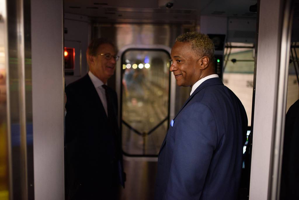 Demetrius Crichlow, the MTA's senior vice president of subways, stands in the drivers' cab of the latest R211