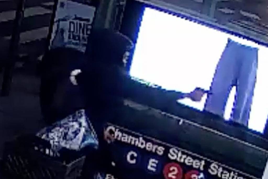 Surveillance video captures candy thief fire gun at 7-Eleven in Manhattan, cops said.