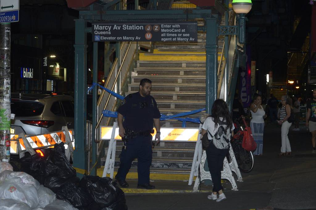 Transit officer secures the entrance to the Queens bound Marcy Av Station of the J-Z-M train where a male was stabbed to his chest, on the platform on June 13, 2023.