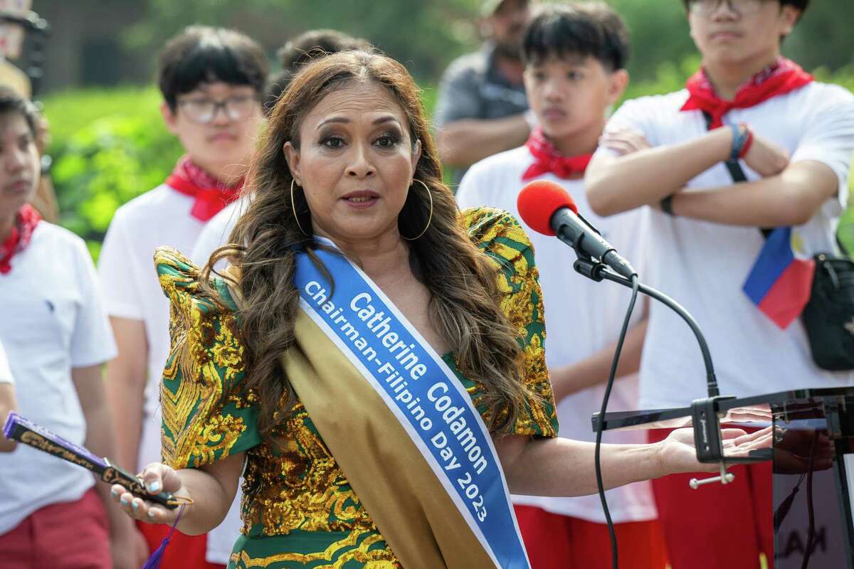 Catherine Codamon, chair of the Filipino Day 2023, speaks prior to the Filipino Day parade on Saturday, July 1, 2023, in Washington Park in Albany, NY.