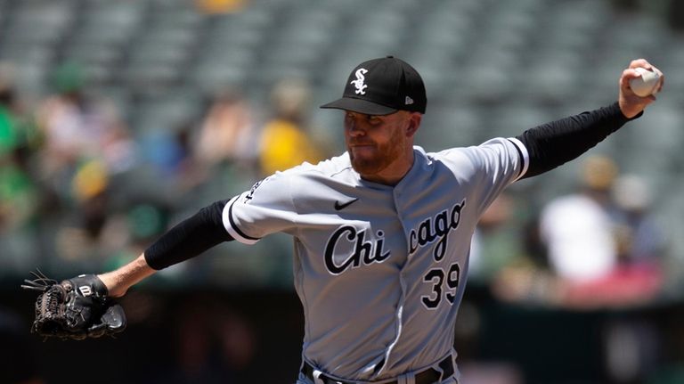 Chicago White Sox pitcher Aaron Bummer delivers against the Oakland...