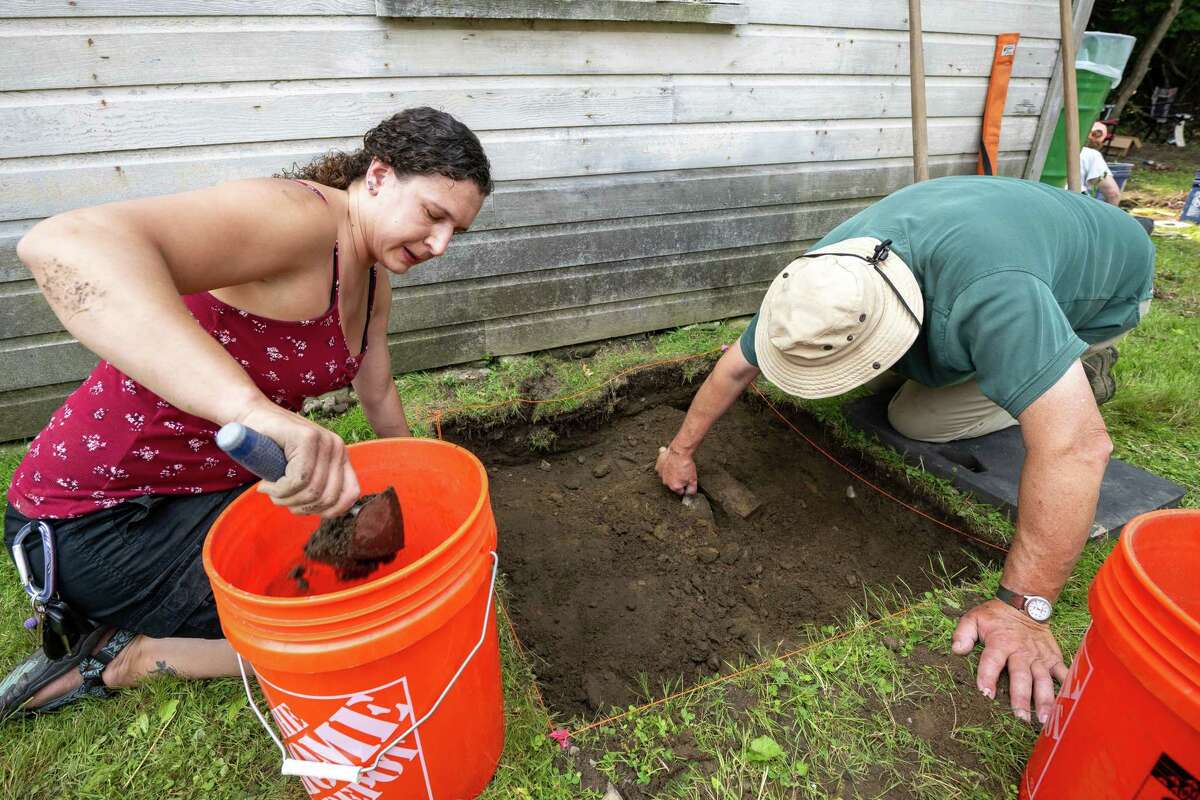 Shayna Thums and Dean Long during an archeological dig at the Historic Grooms Tavern and the adjacent former blacksmith shop on Saturday, July 1, 2023, in Rexford, NY. (Jim Franco/Times Union)