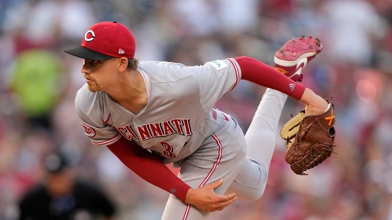 Cincinnati Reds starting pitcher Luke Weaver follows through on a...