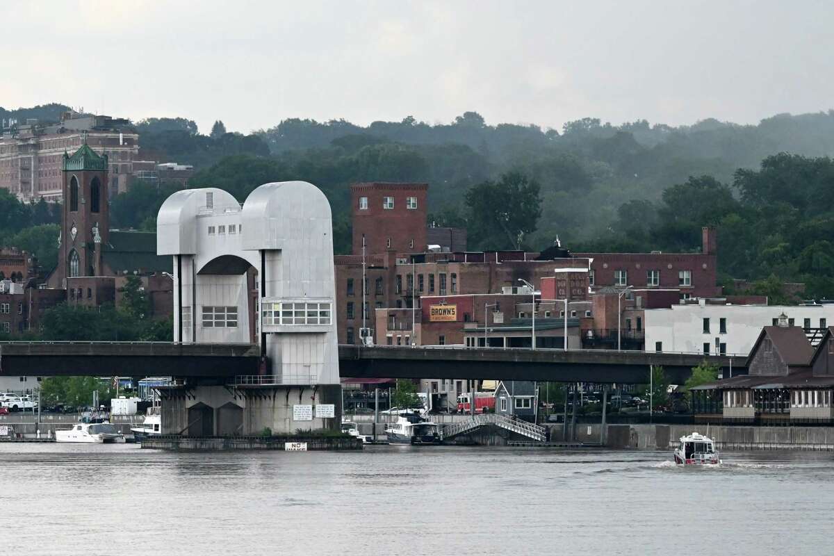 A Troy Fire Department boat pulls heads toward Green Island Bridge and Troy Downtown Marina after a recovering a dead body that was seen floating down the Hudson River on Wednesday, July 12, 2023, in Troy, N.Y. A Troy Police Department officer boarded the boat before heading up to Ingalls Avenue Boat Launch.