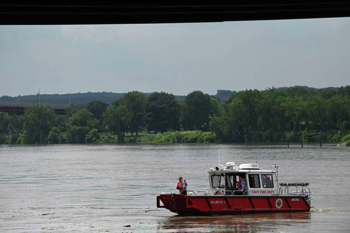 A Troy Fire Department boat pulls into Troy Downtown Marina after a recovering a dead body that was seen floating down the Hudson River on Wednesday, July 12, 2023, in Troy, N.Y. A Troy Police Department officer boarded the boat before heading up to Ingalls Avenue Boat Launch.