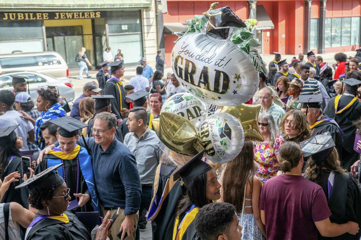 Excelsior University graduates outside the MVP Arena on Friday in Albany.